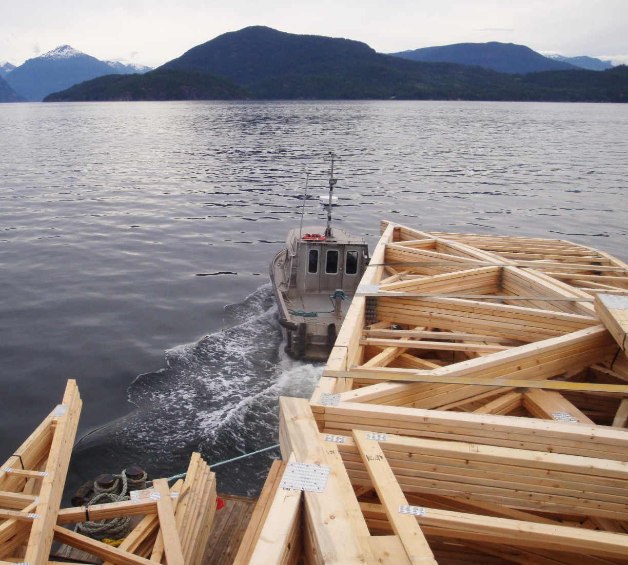 Alliance truss load being transported by barge to a coastal BC job site
